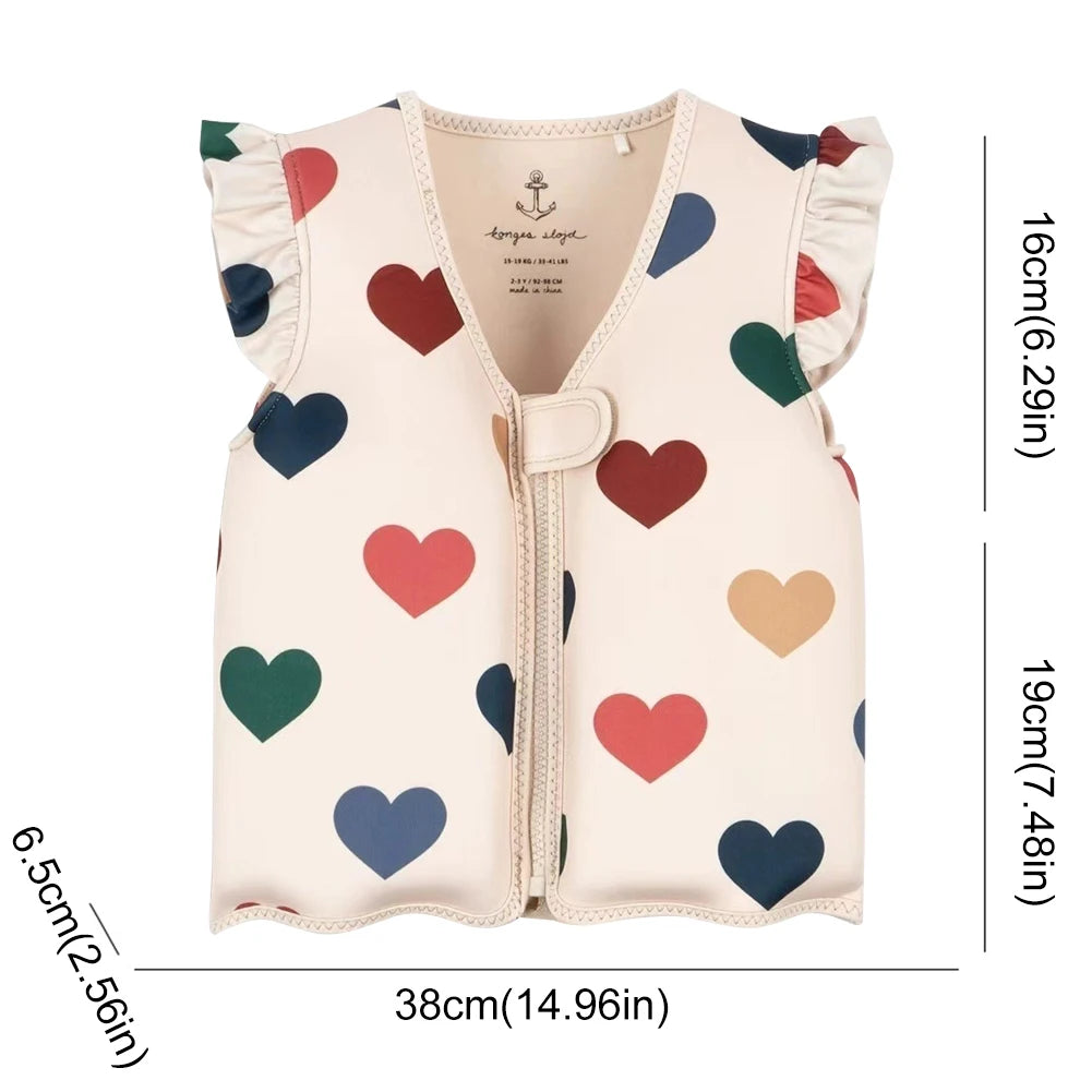 Baby vest with heart pattern and measurements on a white background