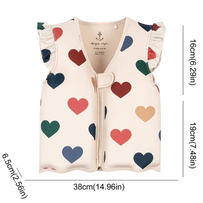 Baby vest with heart pattern and measurements on a white background