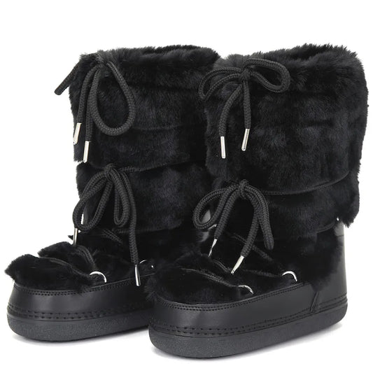 Black fur-lined boots with laces on a white background