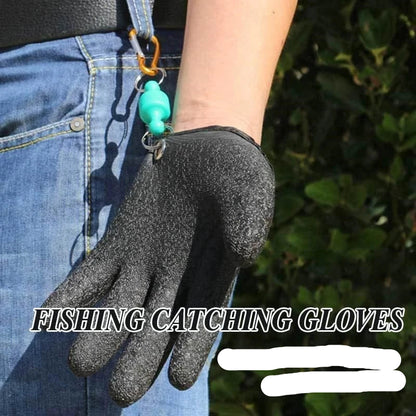 Fishing catching glove with non-slip surface and turquoise charm, worn by a person in blue jeans.