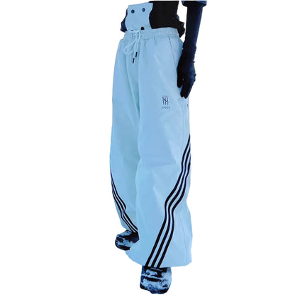 Light blue pants with black stripes and a logo on a white background