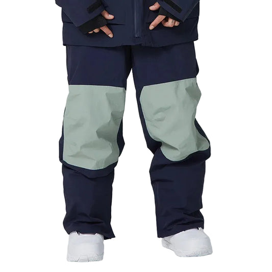 Navy and light gray pants worn by a person on a white background