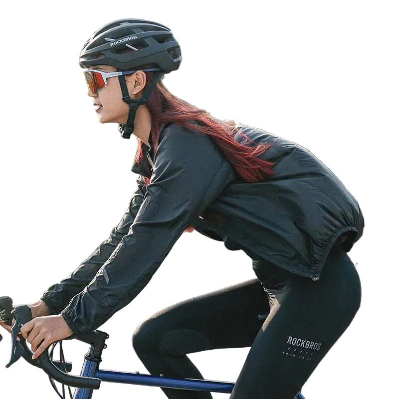Person cycling outdoors with a white background