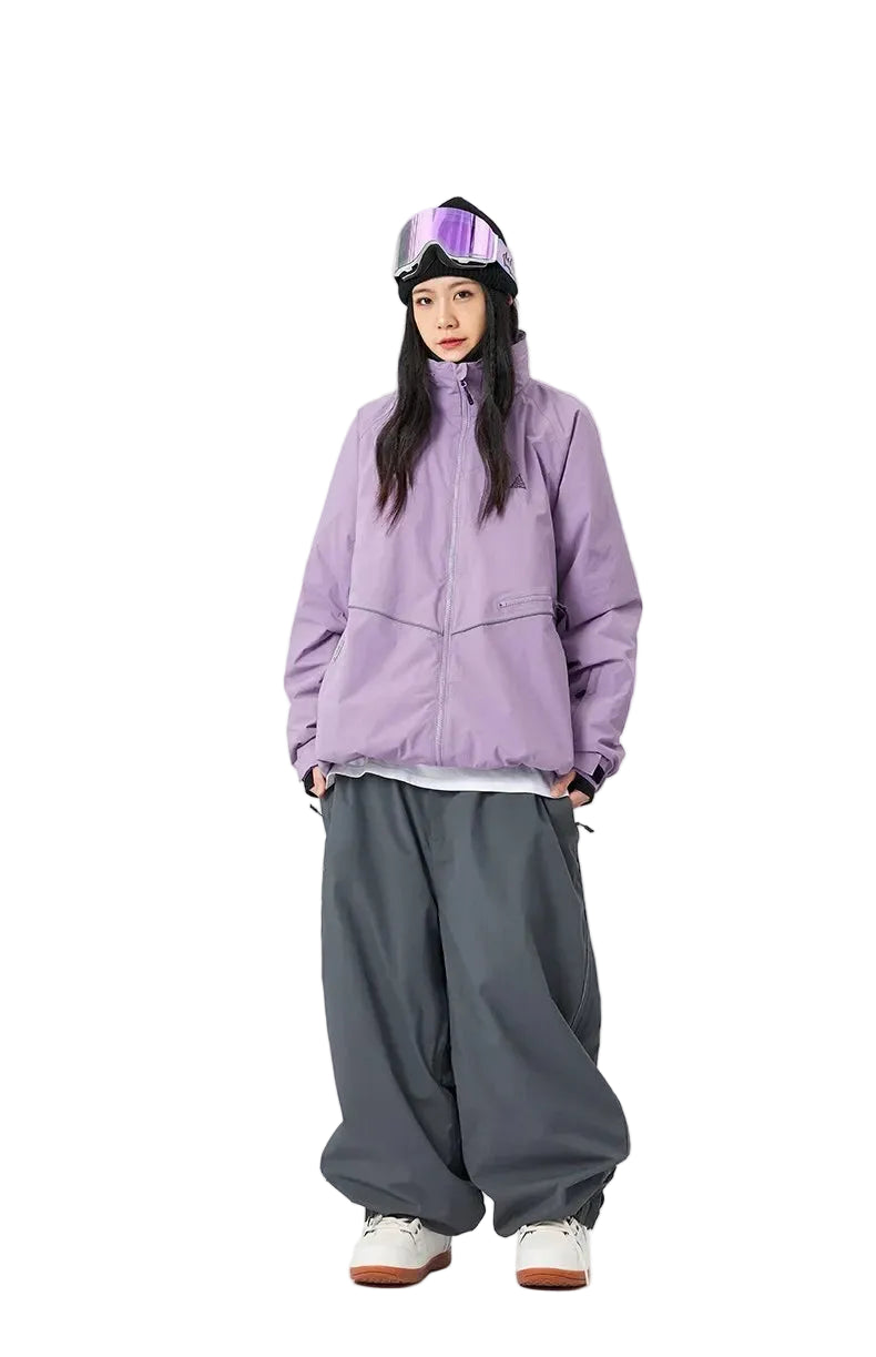 Person wearing a purple jacket and gray pants on a white background