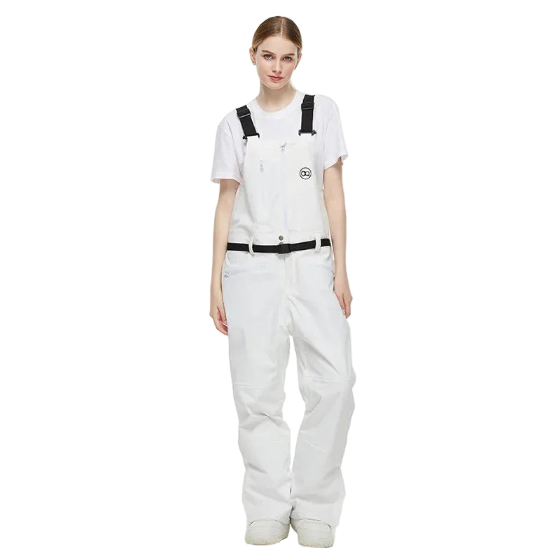 Person wearing white overalls and a white shirt on a white background