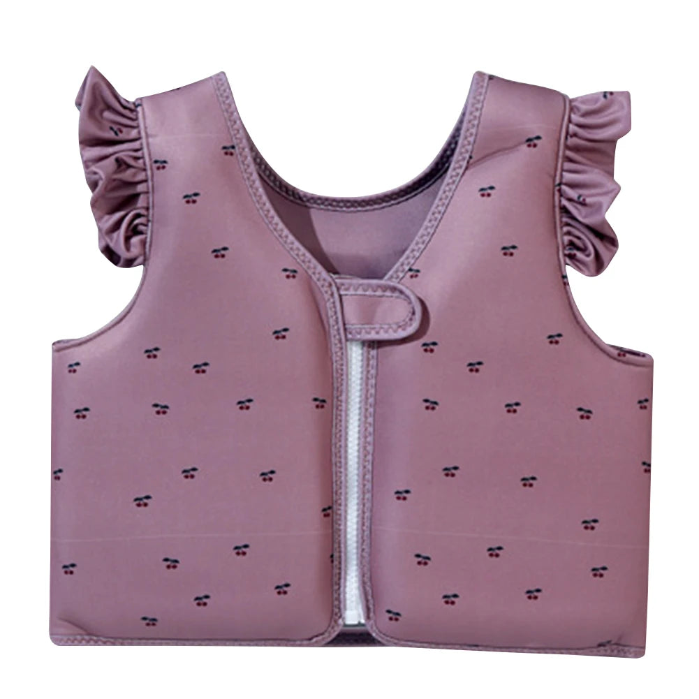 Pink children's vest with ruffled sleeves on a white background