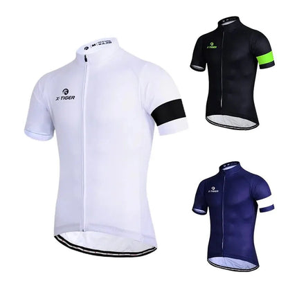 Three cycling jerseys in white, black on a white background.