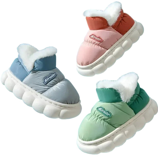 Three pairs of children's winter shoes in red, blue, and green on a white background.