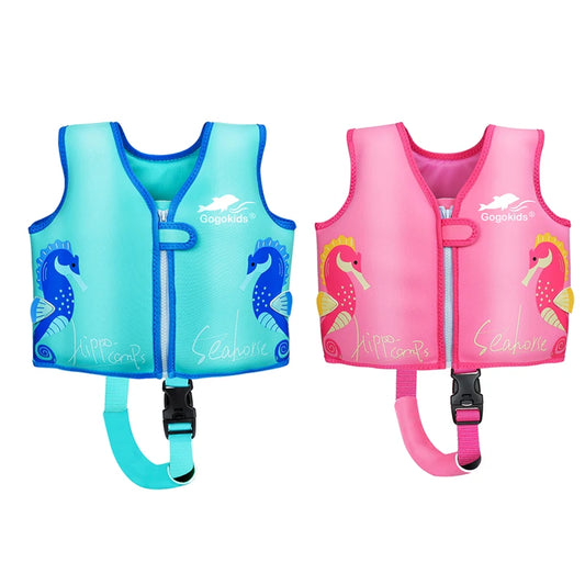 Two children's life vests, one blue and one pink, with seahorse designs on a white background.