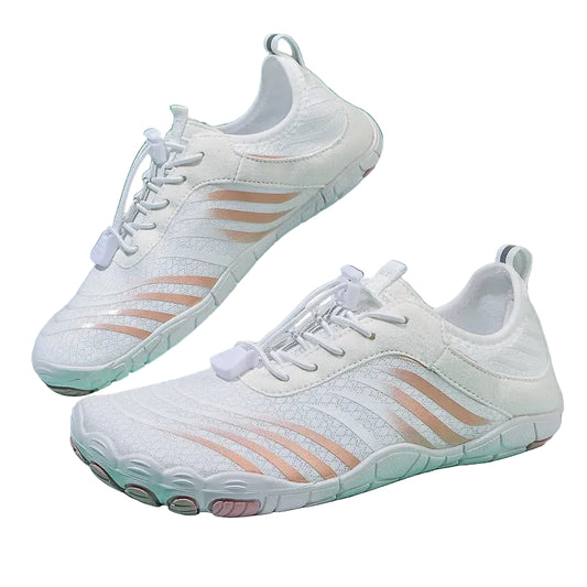White sneakers with pink accents on a white background