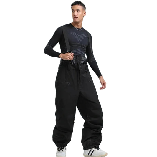 Person wearing a black outfit with suspenders with white background