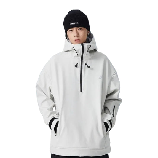 Person wearing a light gray hooded jacket and black beanie standing against a white background