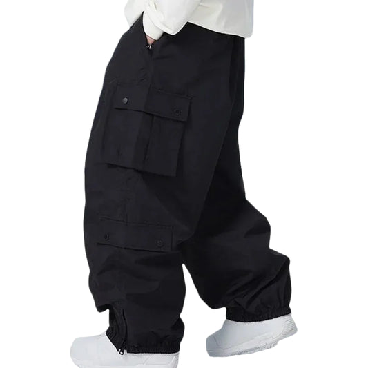 Person wearing black cargo pants and white shoes