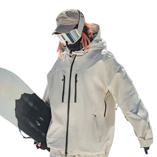 Person wearing a light gray snow jacket with a hood, holding a snowboard on a white background