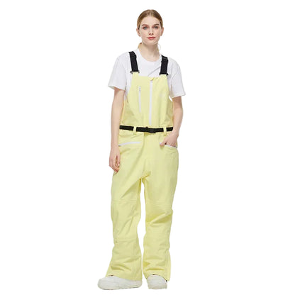 Person wearing a light yellow bib overalls with a white shirt underneath on a white background