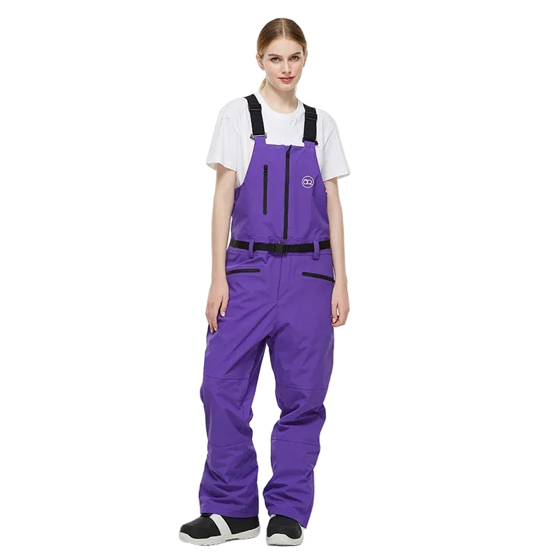 Person wearing a purple snowsuit with a white shirt on a white background